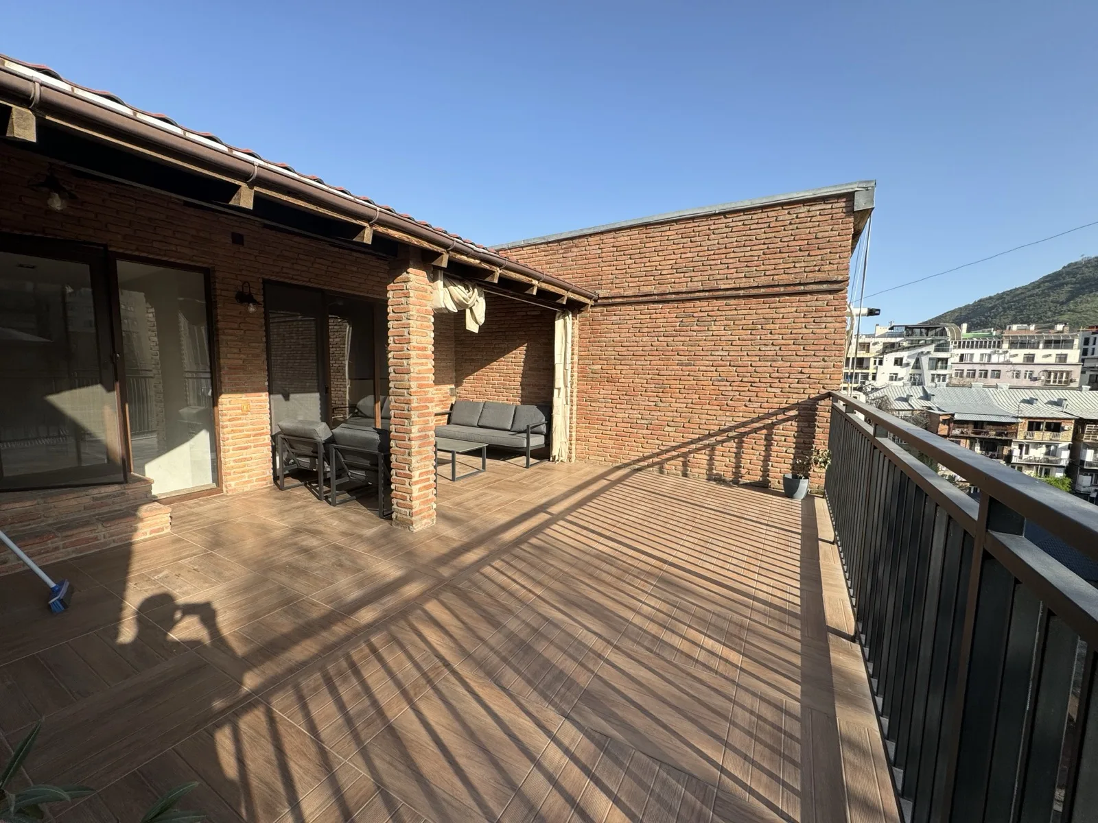 Private rooftop terrace with seating